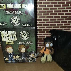 Funko Mystery Mini Bob Stookey from The Walking Dead Series 4.